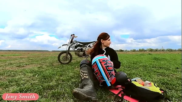 Naked woman riding a Dirt Bike