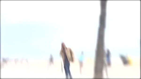 He proves he can pick any girl at the Barcelona beach