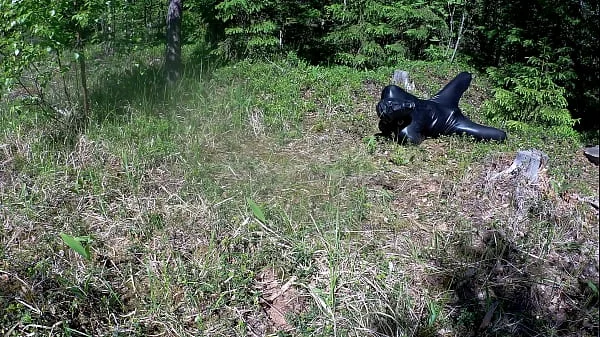 Outdoor hogtie in hot summer day.